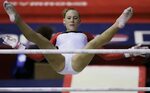 Svenja Hickel of Germany performs on the uneven bars in the 